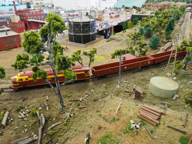 Train with city detail in background